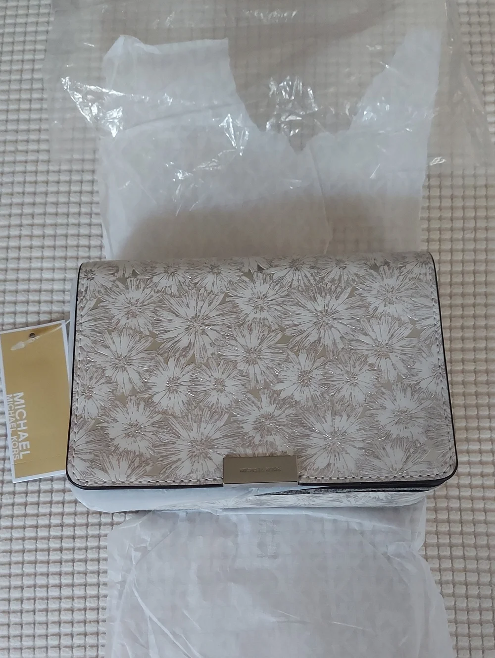 Michael Kors Silver Floral Crossbody/Phone/Wallet with Silver-Tone Plaque
